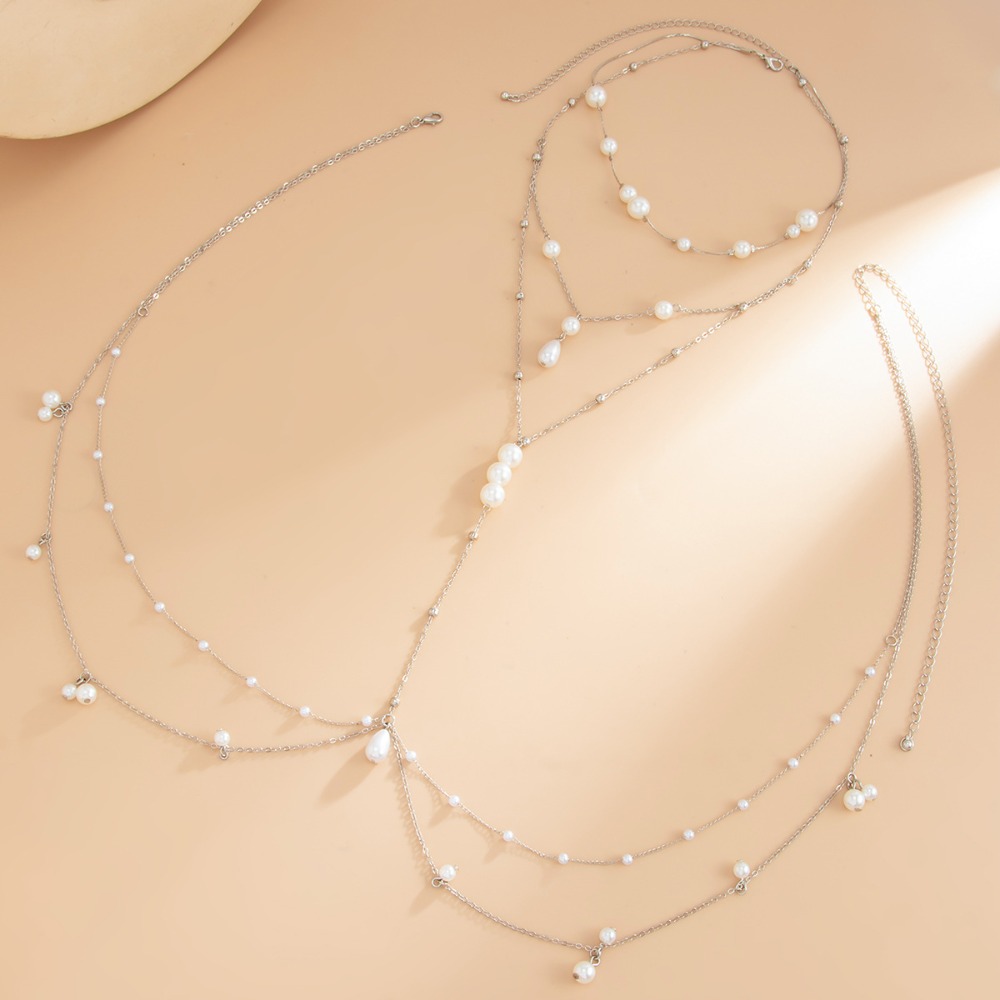 多層模造パールネックレスチェストベリーチェーン一体型ウエスト - Body Jewelry By The Chain Gang のレビューと価格